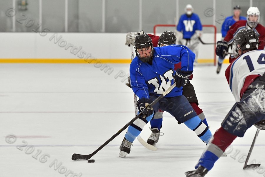 Wheaton College Men\'s Ice Hockey vs Middlesex Community College. - Photo By: KEITH NORDSTROM